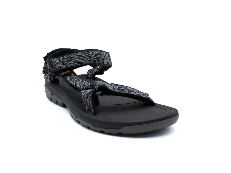 Men's sandals in a neutral color like black or brownMen's sandals in a neutral color like black or brownTEVA Hurricane XLT2