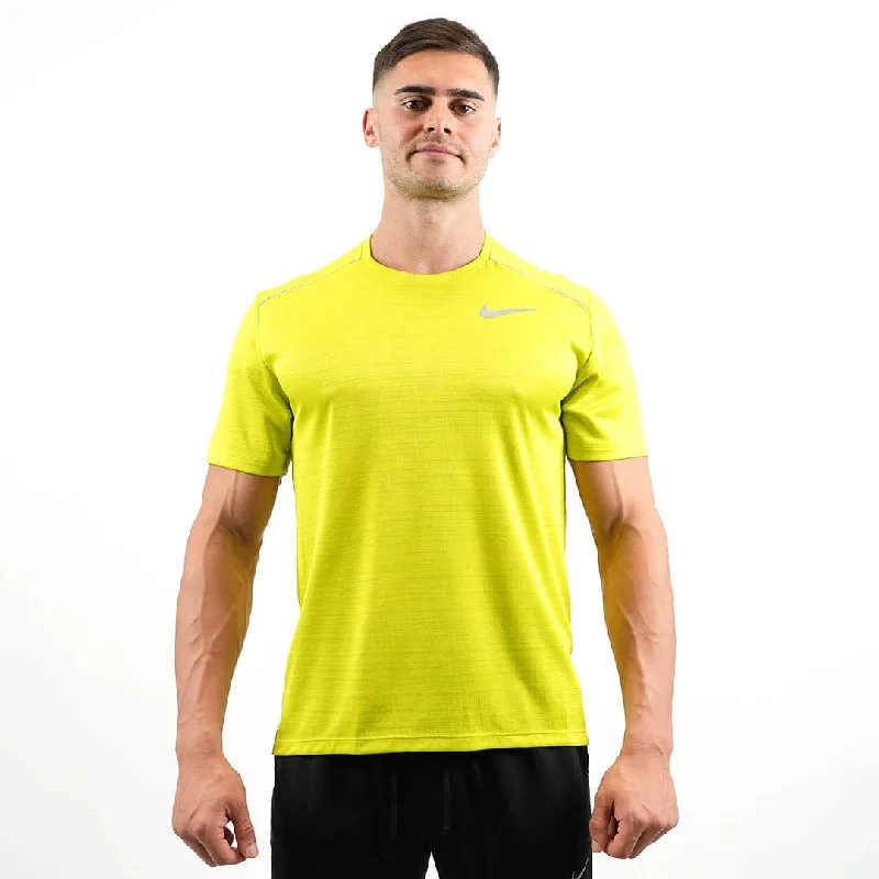 Men's navy blue suede sneakers with gold - toned eyeletsNike Miller 1.0 Short Sleeve T - Shirt (Neon Green)