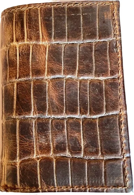 Men's western boots with a leather sole and a heel guardAlligator Trifold